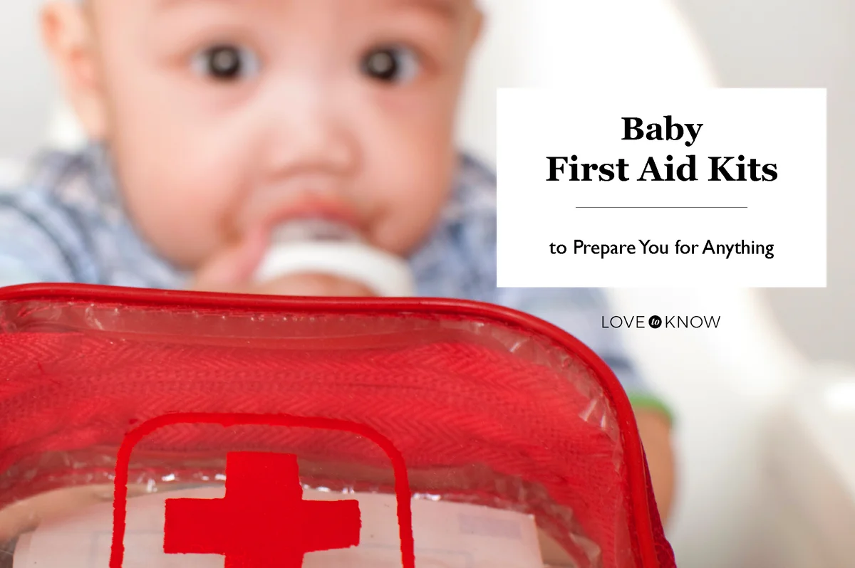 Baby with a first aid kit